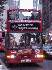 Top right photo you see a New York Sightseeing Tour Bus making its way down Broadway.