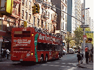 Bottom right picture you see a tour bus on Bleecker Street in Greenwich Village.  Since the economy has taken a downturn the rates for travel in this usually expensive city are down. Now is the perfect time to visit New York and save lots of money.