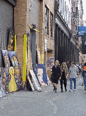 Top right you see Soho in New York.  Soho is known for the many international art galleries, but it's also known for art being sold right on the sidewalk.