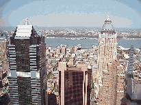 Center right picture was taken from a rooftop in midtown looking down on the Theater District and the Hell's Kitchen area. The tall building to the right is Worldwide Plaza which is close to another area known as Restaurant Row.