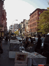 Top right picture you see West Broadway in Soho.  Before the terrorist attacks of September 11th you would have seen the World Trade Towers in the far distance of this picture.  For a few weeks many of the streets in this area were closed.