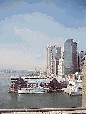 Top right picture you see Pier 17 at South Street Seaport. This picture was taken from the Brooklyn Bridge.  A great way to spend a nice day is to take a walk on the Brooklyn Bridge and enjoy the pretty views of the city.