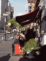 Top right picture you see a coffee house on Sixth Avenue and the corner of West 11th Street. All along Sixth Avenue you'll find lots of shopping from Balducci's (a super gourmet food store) to retailers like Filene's Basement that you might expect in the suburbs.