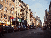 Top right photo you see West 8th Street.  This is where you can shop for funky clothes, shoes and music.  It's also one of the streets for getting your body parts pierced and tattooed.