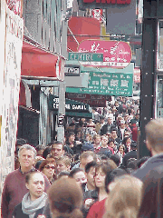 Top right you see Canal Street and Centre Street in Chinatown.  Crowded sidewalks are the normal in this area and anything less is reason for concern.