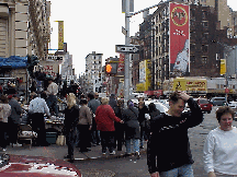 Bottom right picture you see Canal Street and to the left you see one of the street vendors selling merchandise.