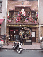 Center right picture you see Santa came in on his Harley for lunch at Il Palazzo at 151 Mulberry Street.