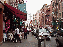 You will be very warmly welcomed as you pass by the restaurants on Mulberry Street.  The waiters stand in front and invite you in tempting you with the days specials.  Top right picture you see Mulberry Street during lunch time.