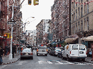 Center right picture you see the traffic moving along on Mulberry.  We suggest you leave the car at home since parking is tight.  The area of Little Italy is small and you can easily walk the neighborhood.