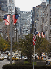 Top right you see Park Avenue. Park Avenue is probably the prettiest avenue in town.  The scene changes here with the seasons.  In the spring the center of Park Avenue is covered in tulips.  Today Park Avenue is lined with American Flags.