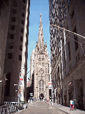 Downtown is filled with beautiful and historical buildings. Top right you see Trinity Church as seen from Wall Street. This Episcopal church was founded by a charter granted by King William III in 1697. The World Trade Towers once stood almost behind it.