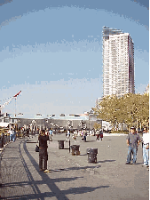 Top right picture was taken at Battery Park looking west towards the Hudson River. A walk in this area makes you feel more like you're touring a resort island than downtown New York City. Seagulls fly overhead as you watch the sailboats and ships cruise.