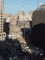 Top right you see Ground Zero as seen from a rooftop in Battery Park.  It seems everyone wants to see this area which will certainly be a part of our history forever.  If you really want to be patriotic, then dine and shop in Lower Manhattan.