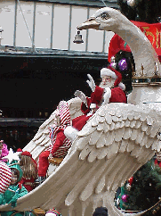 Center right picture you see the man of the day, Santa Claus.  This picture was taken at the Macy's Thanksgiving Day parade when he first came to town.  We're all glad he came back around last night!