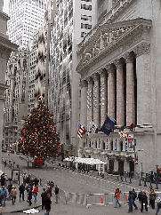 Bottom right picture you see the Wall Street Christmas tree during the daylight hours.  Just in case you are unfamiliar with New York, this area is within a couple of blocks from ground zero of the World Trade Center disaster.