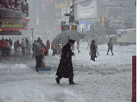 Top right photo you see the near blizzard conditions in Times Square before the celebration last year.