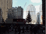 Bottom right picture is the Christmas Tree in front of the area where the clean up of the World Trade Center goes on night and day.