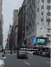 Bottom right picture you see 7th Avenue. Up the street to the right you see one of the entrances to Macy's Department Store.