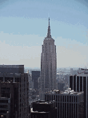 Top right picture you see the Empire State Building as seen from the rooftop of another midtown building.  There are 1,860 steps in the Empire State Building. You can zip up to the top in one of the 73 elevators that will take you less than a minute.