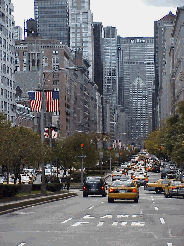 Bottom right picture you see Park Avenue.  In the distance you see the Met Life Building.  Park Avenue like most of NYC is covered in American flags these days.  New Yorkers are proud of their city and their country.