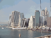 Center right picture you see the skyline of the city as seen from the Brooklyn Bridge.  To the right of the photo is the area of South Street Seaport where you pick up the free tickets for the viewing platform.