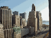 Center right photo you see the view of the South End of the island as seen from a rooftop on Rector Street near ground zero.