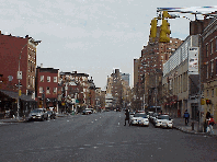 Bottom right picture you see Seventh Avenue in Greenwich Village.  In this area you'll find sports clubs, gourmet food stores, coffee houses and many restaurants.