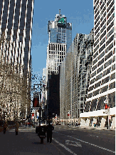 Top right picture you see 42nd Street. In the distance you see the new 4 Times Square Building.  To the right in the picture you see the slope of the WR Grace Building.