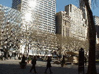 Center right picture you see a view through Bryant Park looking at the WR Grace Building. In the large open space of Bryant Park you can see many of the midtown buildings. The architecture of the WR Grace Building is very outstanding.