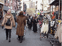 Bottom right you see ladies shopping at the Jewish market.