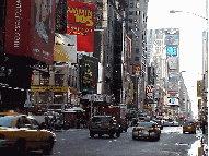 Top right photo you see a distant shot of Broadway and Times Square.  In the far distance you see the Jumbotron.