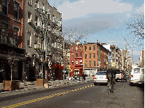 Center right picture is West Broadway in Soho with Houston Street in the far distance.  Soho is known primarily for the upscale art galleries that attract an international clientele.