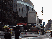 Bottom right picture you see Madison Square Garden.  This is where you go to see sporting events and concerts in NYC.