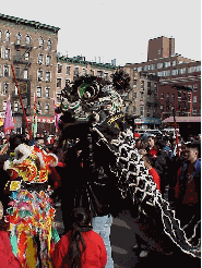 It's the year of the Horse!  You don't have to speak Chinese to take part in one of the most colorful and exciting events in New York City's Chinatown. Top right picture you see a couple of dragons in the Chinese New Year parade in Chinatown.