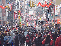 Center right picture you see some of the crowd as they gather on Mott Street for the Chinese New Year Lion Dance Parade.