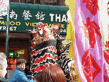 Bottom right picture you see a close up of one of the orange dragons blessing a business.