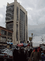 Top right photo you see the Adam Clayton Powell Jr. Office Building as seen from 125th Street in Harlem.