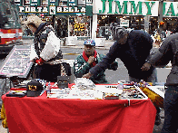 Center right photo you see a famous Harlem artist, Franko. Franko paints the gates of the Harlem store fronts and sells artwork on 125th Street.  Need to know something about art or Harlem, ask Franko!