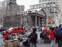 Bottom right picture you see St. Paul's Chapel which is in front of the area of the WTC.  This is where meals have been served to workers and people place flowers and memorials.