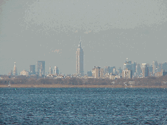 Center right picture you see the skyline of NYC as seen from Rockaway Beach.  In the center you see the Empire State Building.