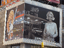 Are you longing for the good ole days when ladies dressed like ladies?  Center right picture you see Britney Spears in a retro look with a today's version of the pretty star on the other side of the billboard.