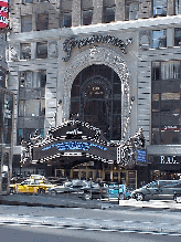 Center right picture you see the Paramount Building in Times Square.  The Paramount Building was erected in 1926 to house a movie theater and offices.  Of course, Times Square is where you'll see some of the best entertainment in the world.