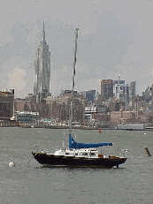 Top right picture you see the Empire State Building behind a sailboat docked in the East River.