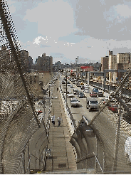 Top right picture you see the stairs up to the Williamsburg Bridge.  In the distance you are looking at Delancey Street and the Lower East Side of NYC.