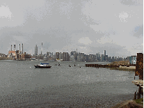 Center right photo you see a distant shot of the New York City skyline as seen from Williamsburg, Brooklyn.