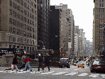 Bottom right picture you see Park Avenue near the Empire State Building.  Here you'll pass by tourists and business people.