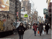 Center right picture you see Canal Street in Chinatown. Of course you are going to hear a lot of Chinese being spoken on the sidewalks here. You'll also see many sidewalk sales of T-shirts, souvenirs and just about anything you can imagine.