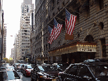 Bottom right picture you see the St. Regis Hotel off Fifth Avenue.  Here you'll see lucky people checking into one of the finest hotels in NYC. They'll be staying right around the corner from the best shopping in NYC on Fifth Avenue.