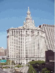 Top right picture you see the Municipal Building at 1 Centre Street.  The Municipal Building was erected in 1914.  There is a pedestrian walkway that leads to Police Plaza which is the headquarters for the NYPD.