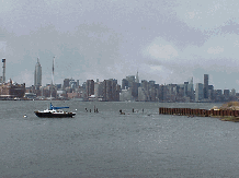 Center right picture you see a view of the city of Manhattan.  To the far left you see the Empire State Building.